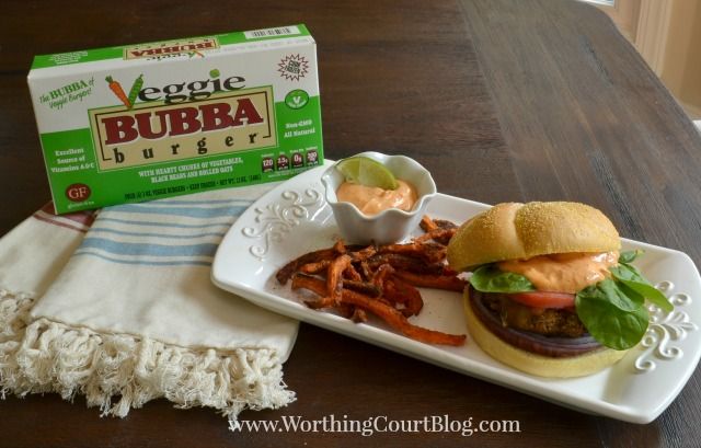 A box of Veggie Bubba burgers and the cooked burgers on a plate.